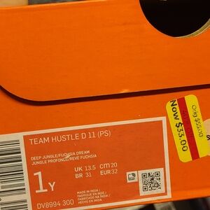 Nike Team Hustle D 11 PS in Deep Jungle and Fuchsia 1Y